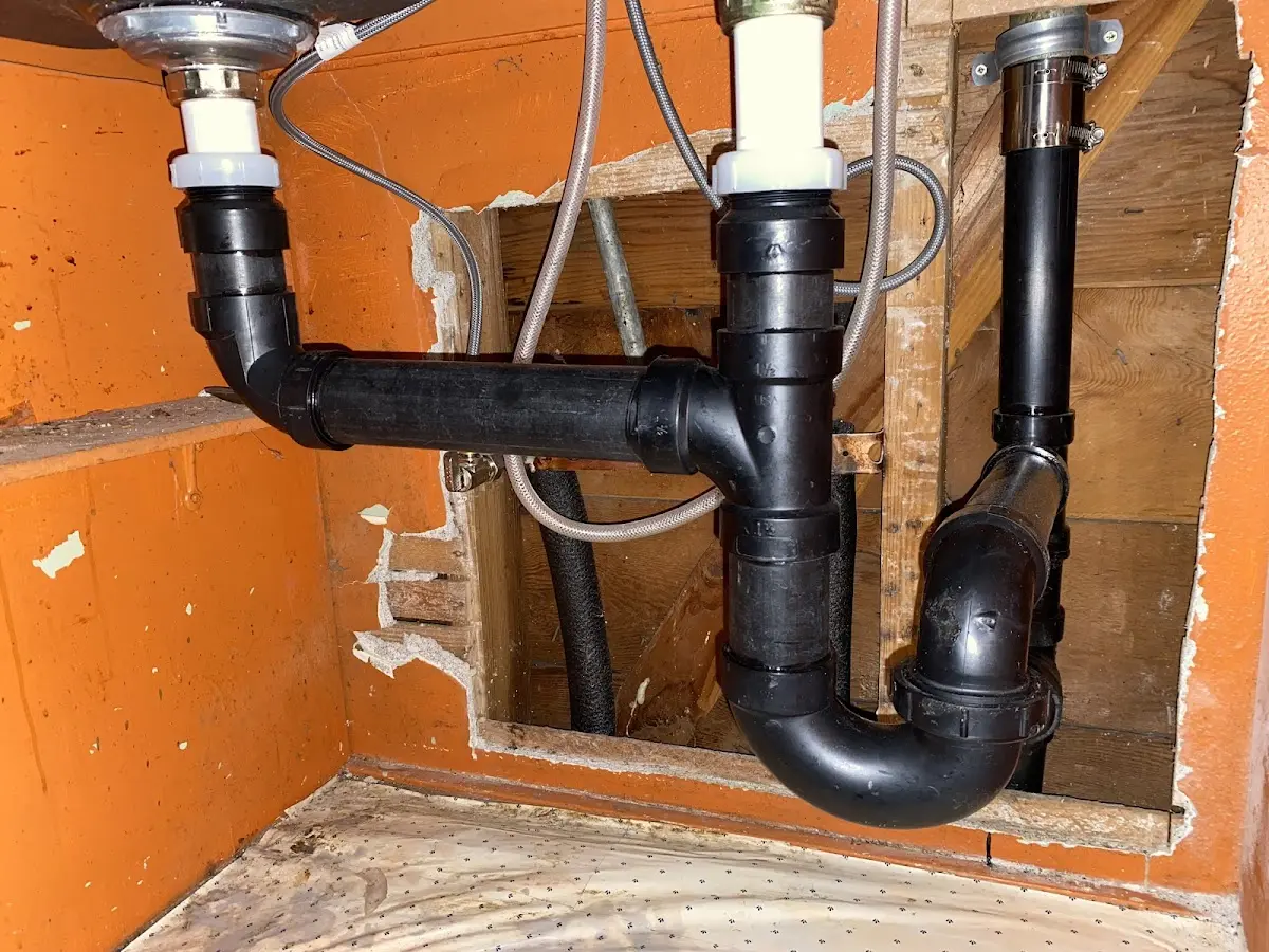 Professional Garbage Disposal Repair equipment and tools on the job in North Caldwell